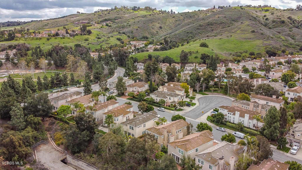 11249 Shadyridge Road Moorpark, CA 93021 - Photo 34 of 48 an aerial view of residential house with parking and mountain view