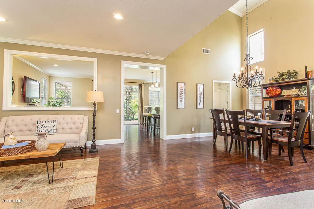 11249 Shadyridge Road Moorpark, CA 93021 - Photo 7 of 48 a view of a dining room with furniture and wooden floor