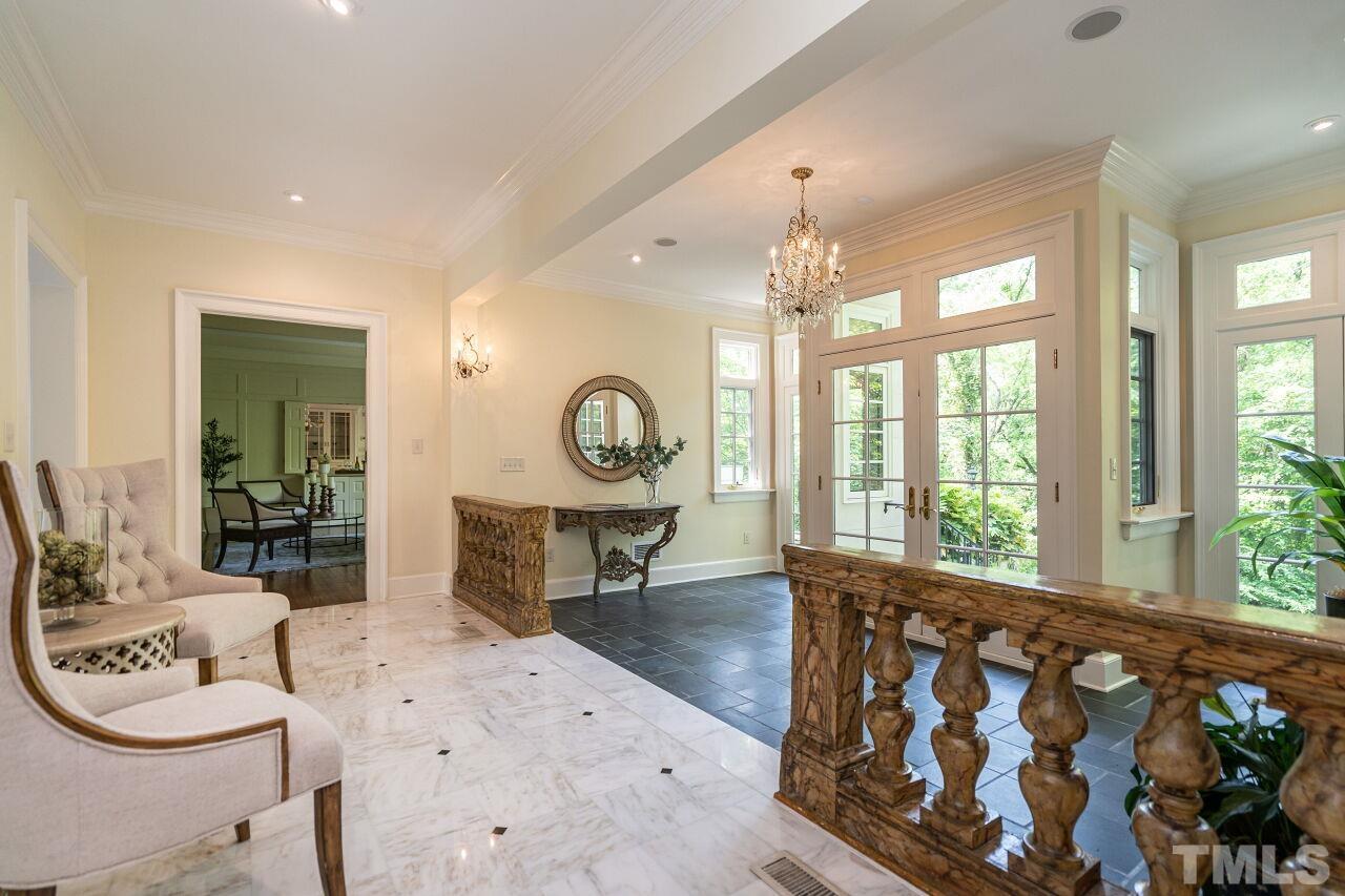 903 Wakestone Court Raleigh, NC 27609 - Photo 10 of 40 a living room with furniture and a large window