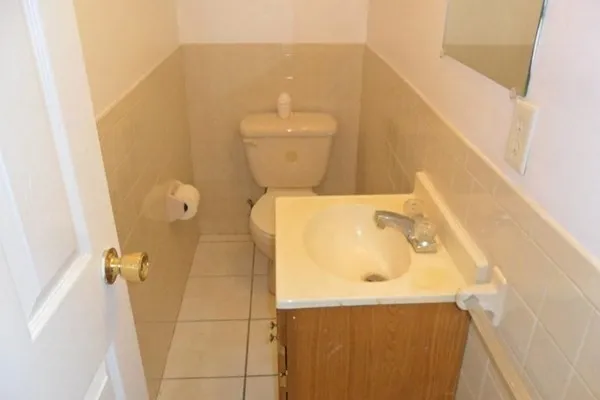 a bathroom with a sink and toilet
