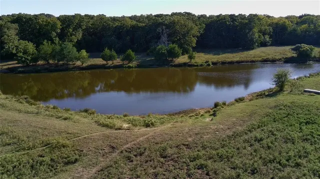 a view of a lake with a mountain in the background