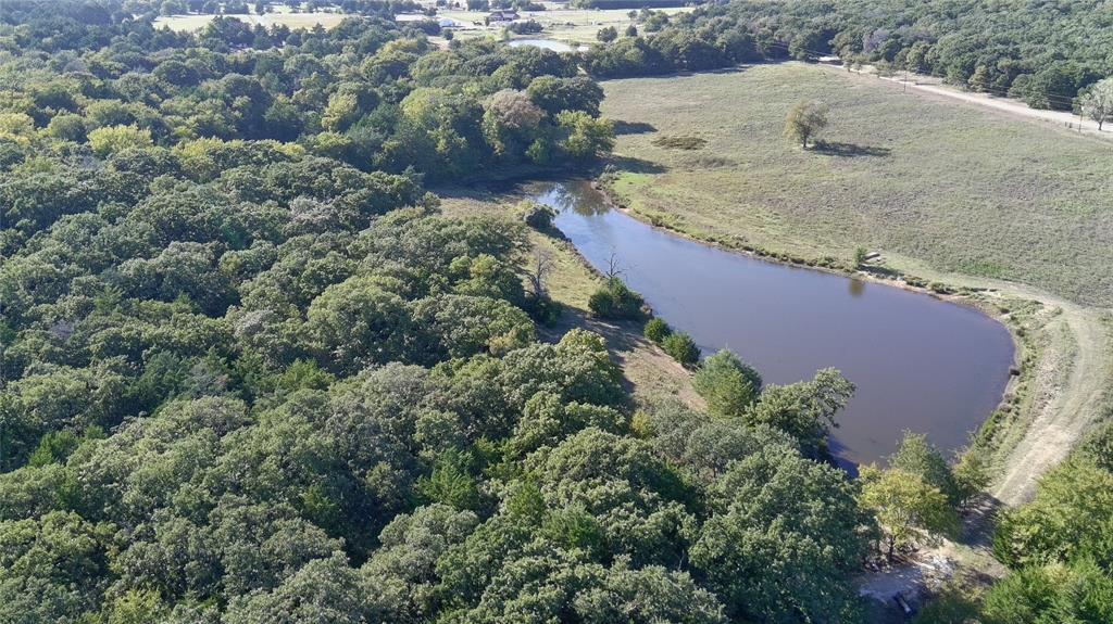 9190 East Fm 922 Valley View Valley View, TX 76272 - Photo 10 of 11 an aerial view of residential houses with outdoor space