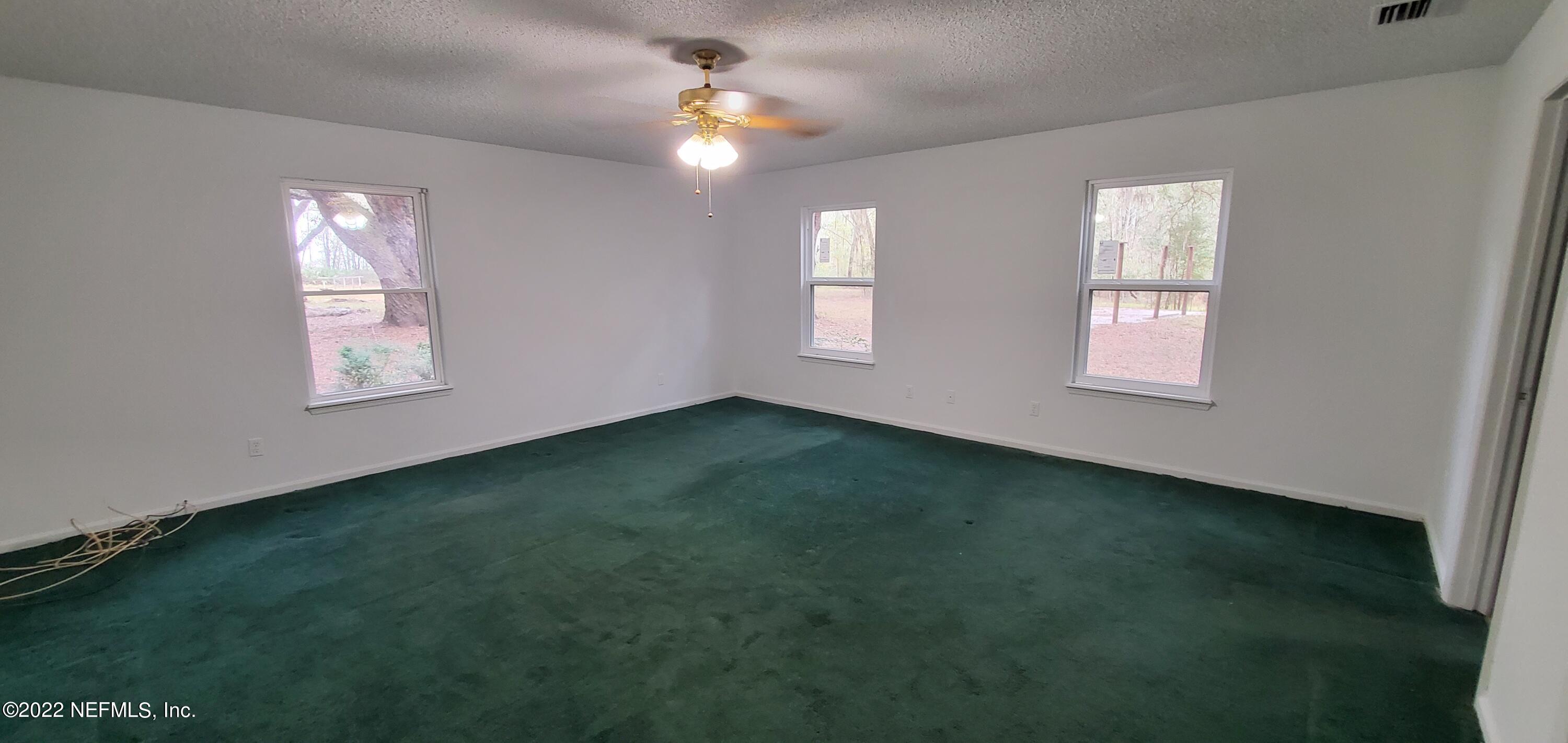 3578 Hamp Hicks Road Bryceville, FL 32009 - Photo 7 of 16 a view of a room that has a window in it