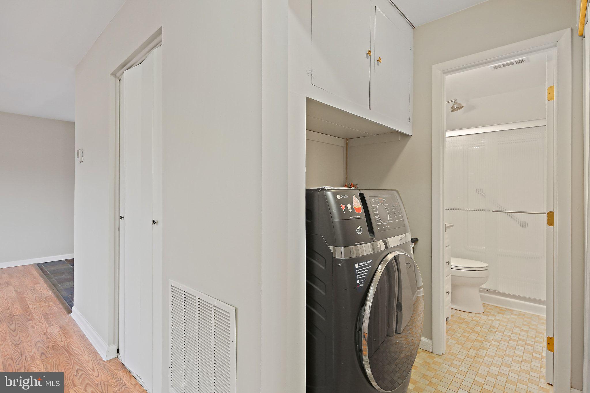 1430 Oakdale Road Glen Burnie, MD 21060 - Photo 21 of 34 a bathroom with a toilet and a sink