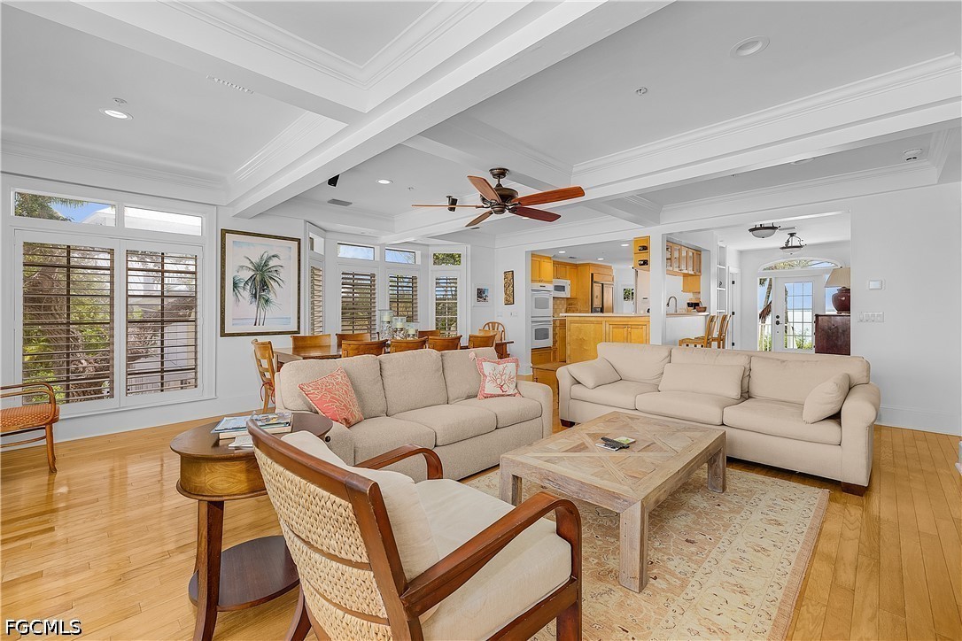 128 Useppa Island Useppa Island, FL 33922 - Photo 15 of 50 a living room with furniture and a large window