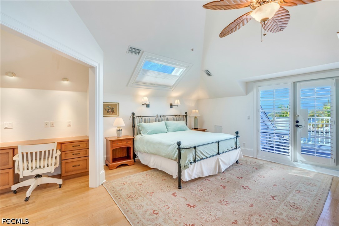128 Useppa Island Useppa Island, FL 33922 - Photo 31 of 50 a bedroom with a large bed and a window