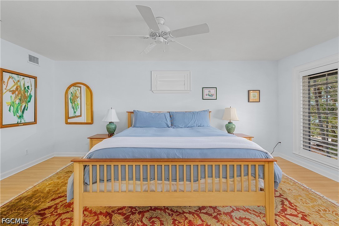 128 Useppa Island Useppa Island, FL 33922 - Photo 47 of 50 a bedroom with a bed and a window