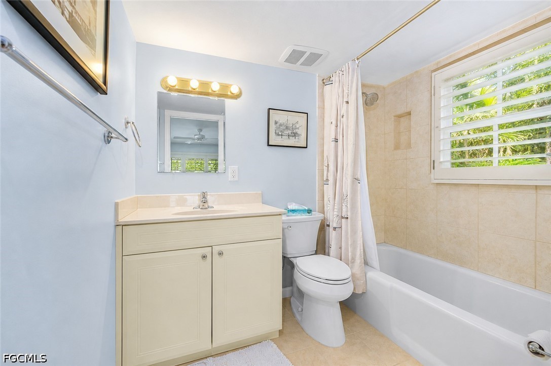128 Useppa Island Useppa Island, FL 33922 - Photo 49 of 50 a bathroom with a sink a toilet and a bathtub
