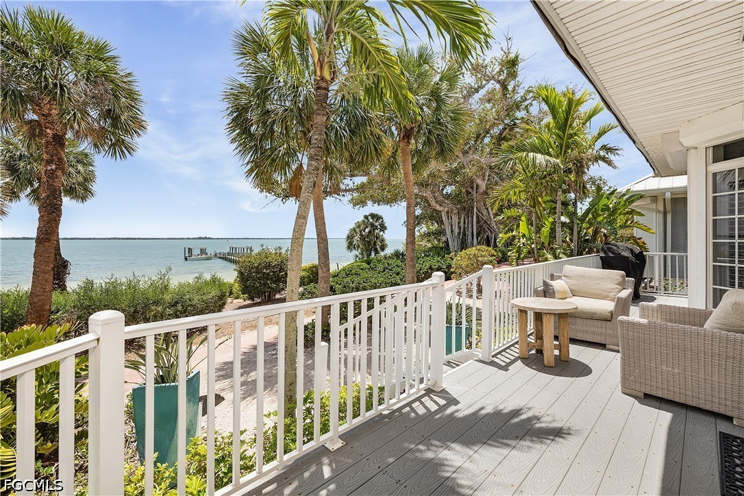 128 Useppa Island Useppa Island, FL 33922 - Photo 9 of 50 a view of a patio with iron fence