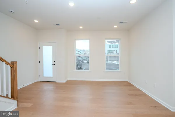 an empty room with windows