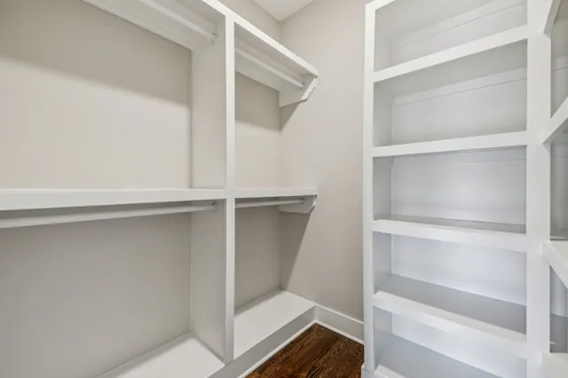 a view of an empty walk in closet