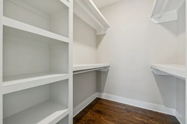 a view of an empty walk in closet