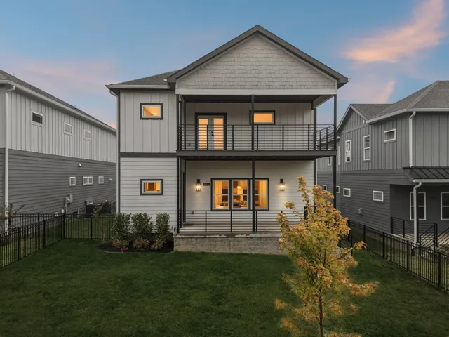a picture of a room with cabinets and refrigerator