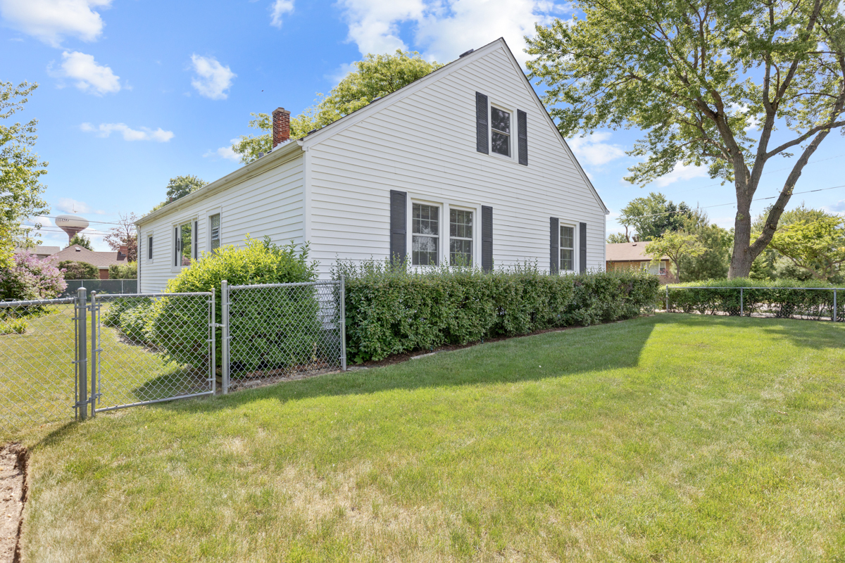 216 Center Avenue Wheeling, IL 60090 - Photo 25 of 25 a view of a house with a yard