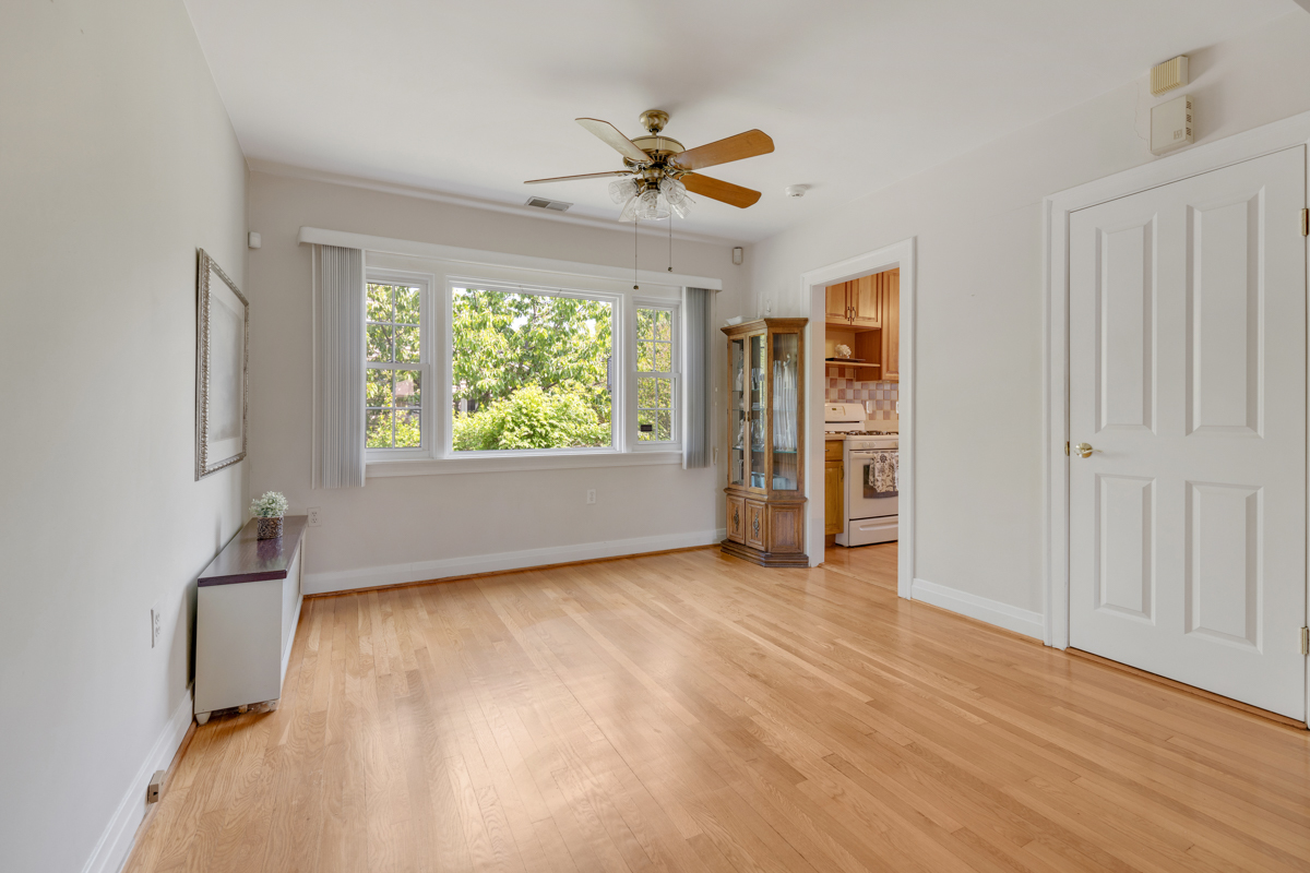 216 Center Avenue Wheeling, IL 60090 - Photo 6 of 25 a view of an empty room with a window
