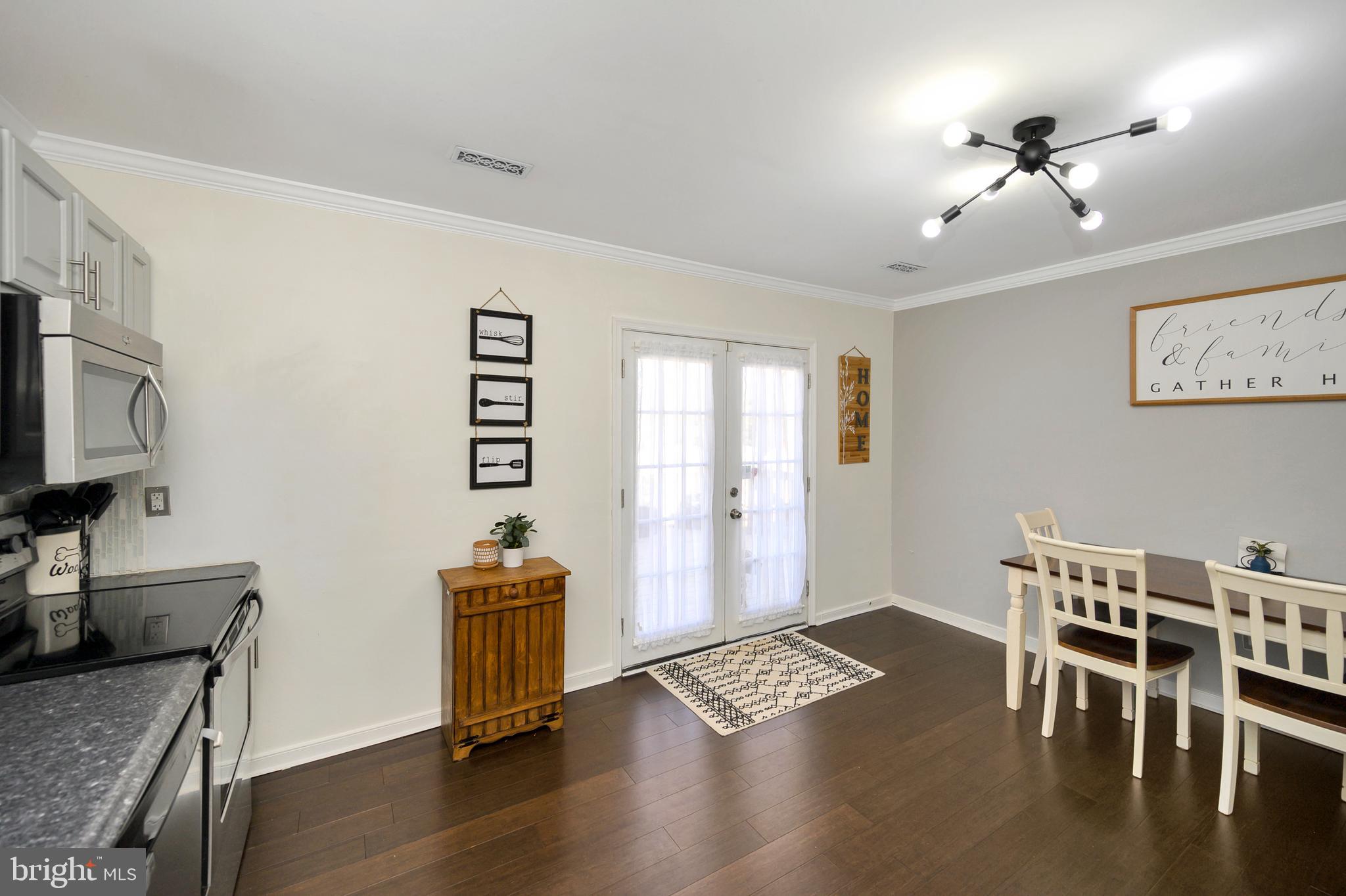 28 Benner Loop Ruther Glen, VA 22546 - Photo 28 of 54 a view of a livingroom with furniture and wooden floor