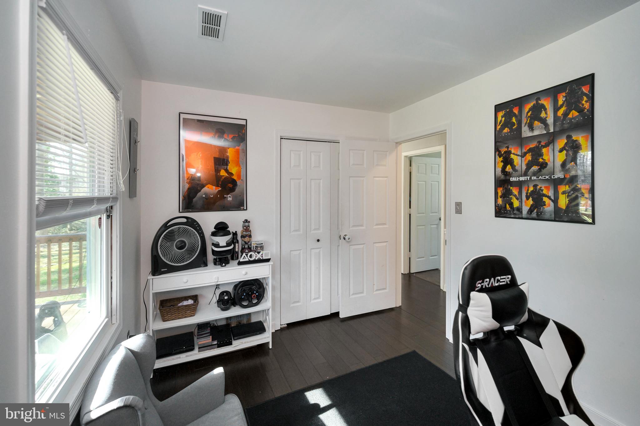 28 Benner Loop Ruther Glen, VA 22546 - Photo 37 of 54 a view of a workspace with furniture and a window