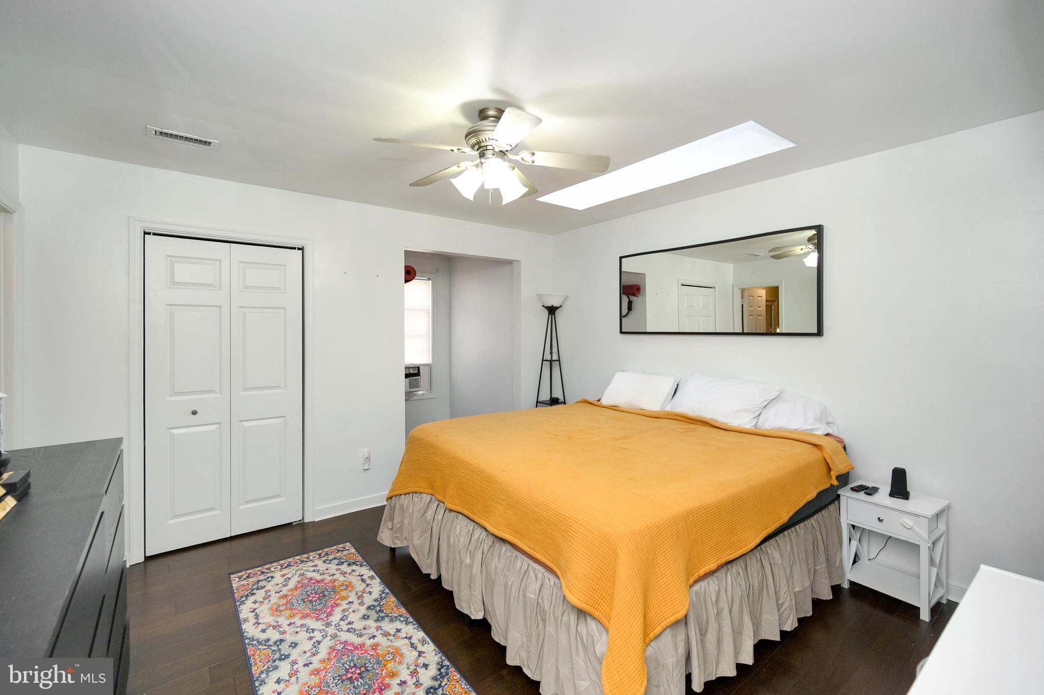 28 Benner Loop Ruther Glen, VA 22546 - Photo 40 of 54 a bedroom with bed and paintings on the wall