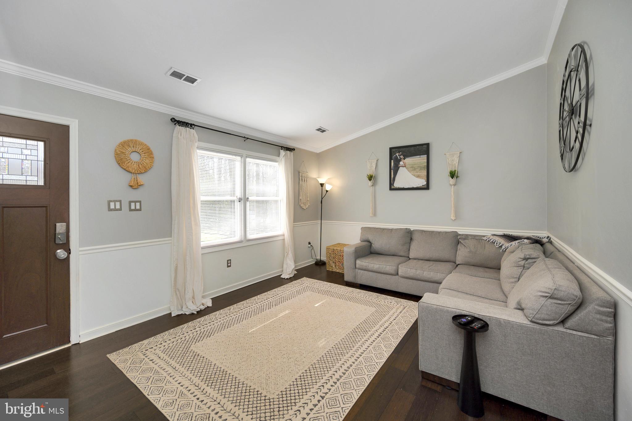 28 Benner Loop Ruther Glen, VA 22546 - Photo 46 of 54 a living room with furniture and a window