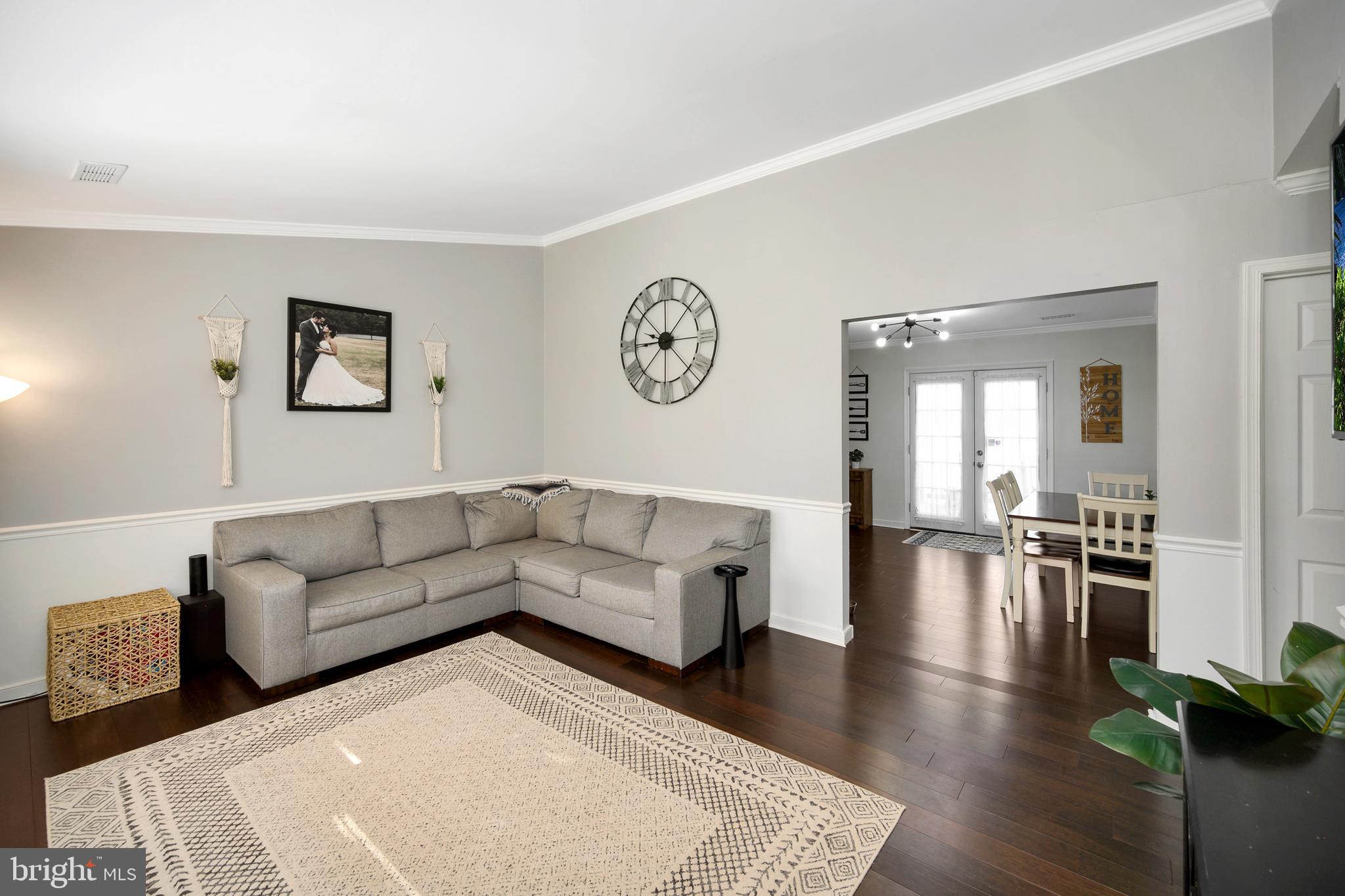 28 Benner Loop Ruther Glen, VA 22546 - Photo 48 of 54 a living room with furniture and a table