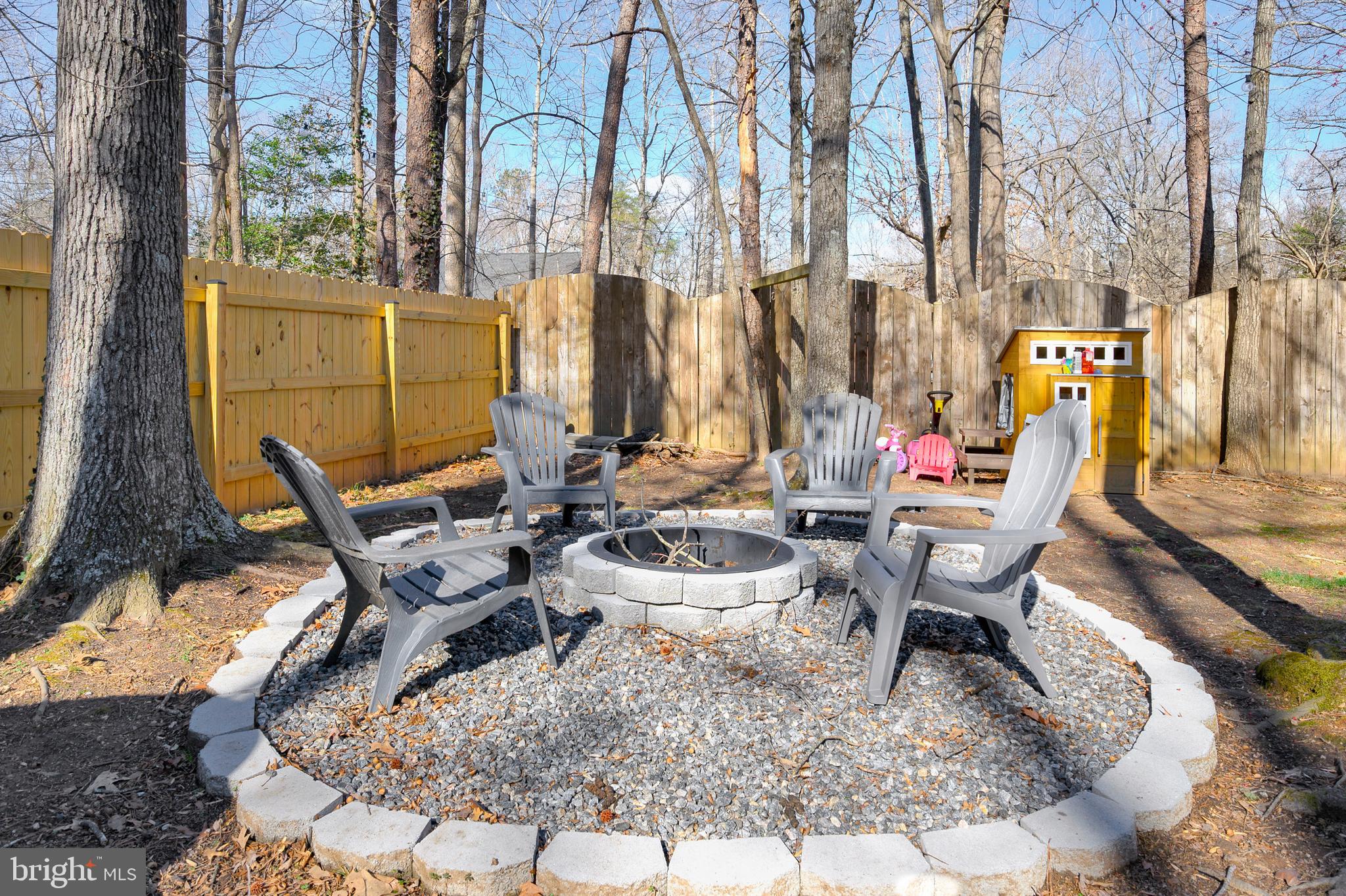 28 Benner Loop Ruther Glen, VA 22546 - Photo 54 of 54 a view of outdoor space with table and chairs