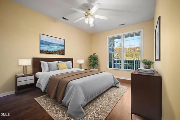 a bedroom with bed and a window