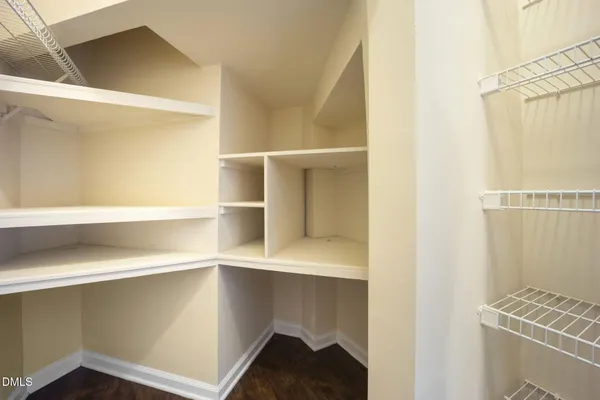 a view of an empty walk in closet