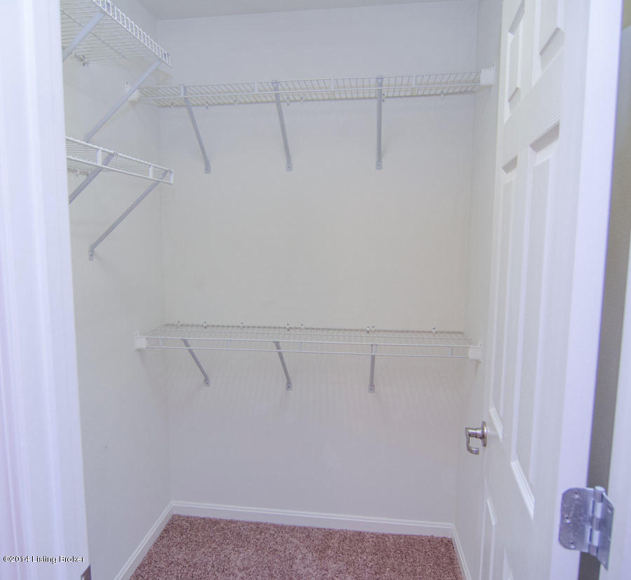 6447 Renate Road Louisville, KY 40291 - Photo 22 of 39 The master bedroom's walk-in closet with lots of shelving!