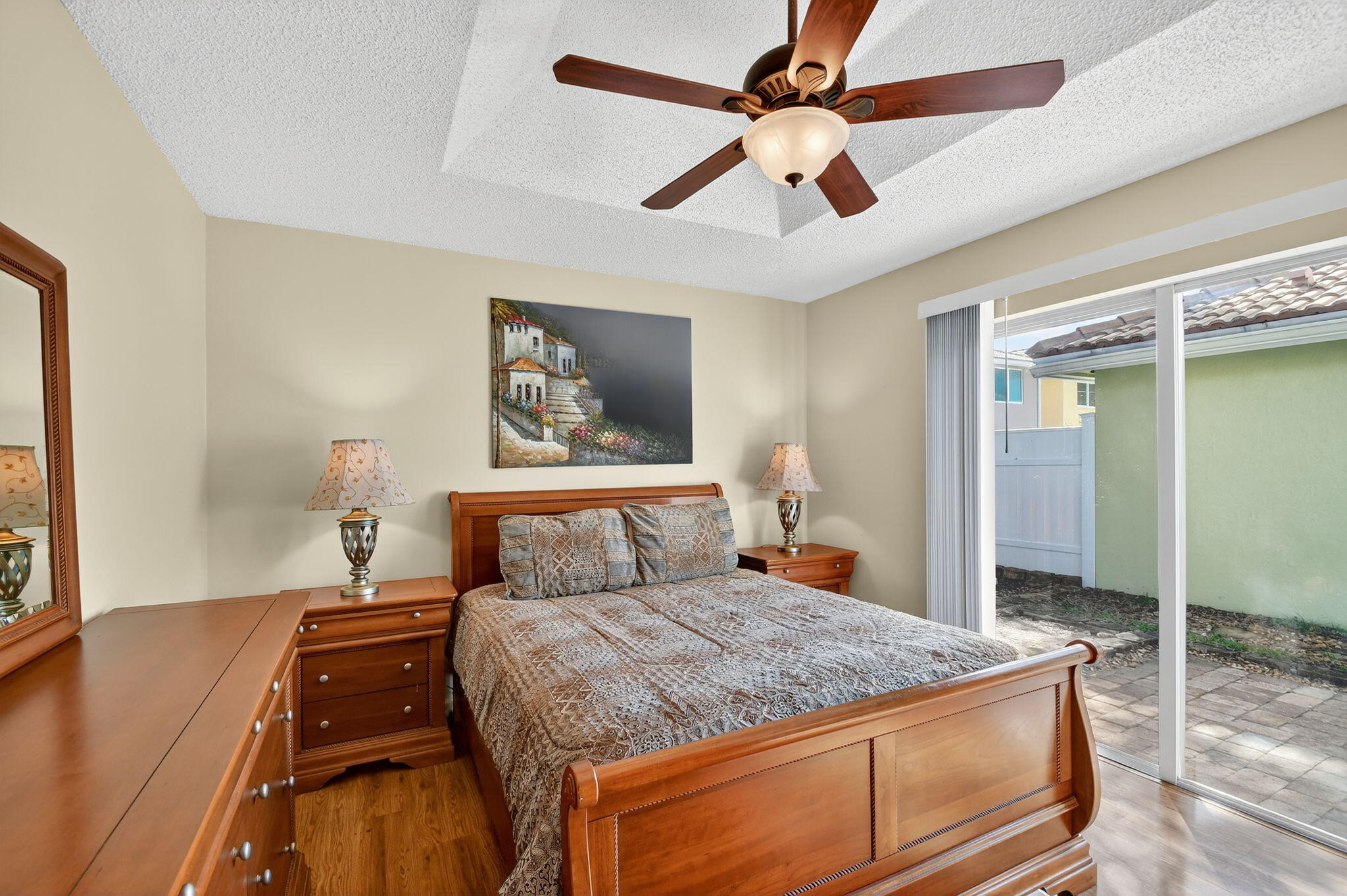 3386 Commodore Court West Palm Beach, FL 33411 - Photo 16 of 79 a bedroom with a bed and a large mirror