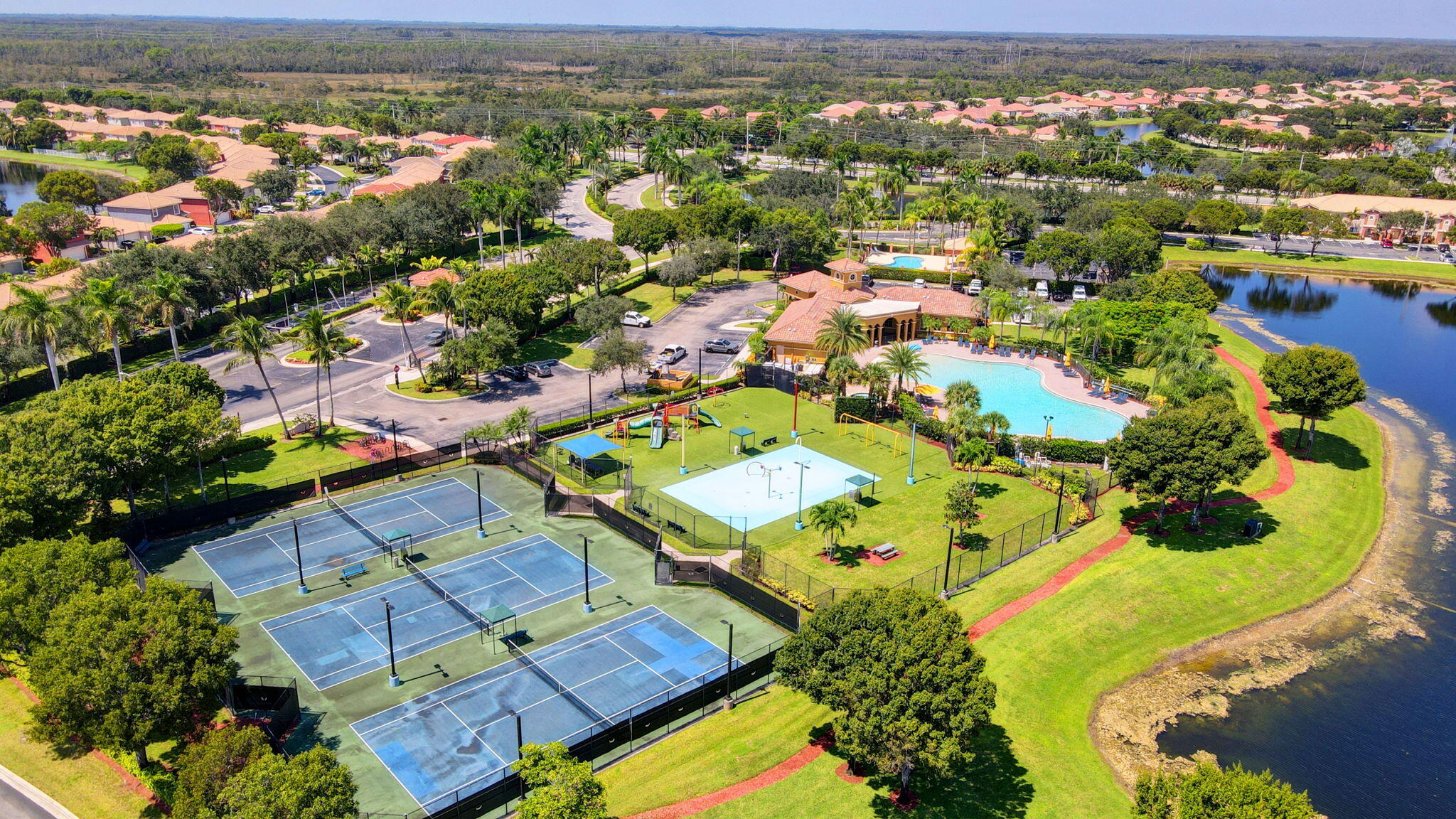 3386 Commodore Court West Palm Beach, FL 33411 - Photo 37 of 79 an aerial view of residential houses with outdoor space