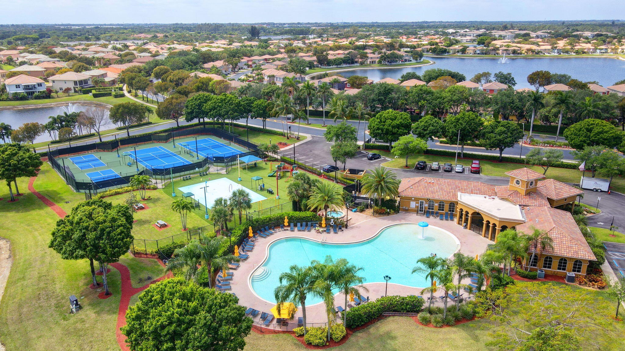 3386 Commodore Court West Palm Beach, FL 33411 - Photo 58 of 79 an aerial view of a house with a swimming pool yard and outdoor seating