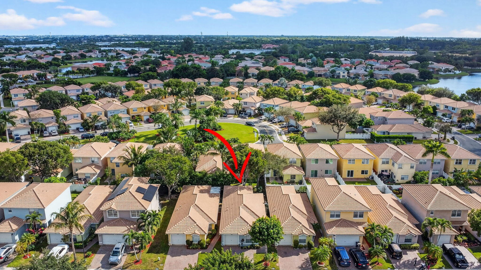 3386 Commodore Court West Palm Beach, FL 33411 - Photo 64 of 79 an aerial view of residential houses with outdoor space and swimming pool