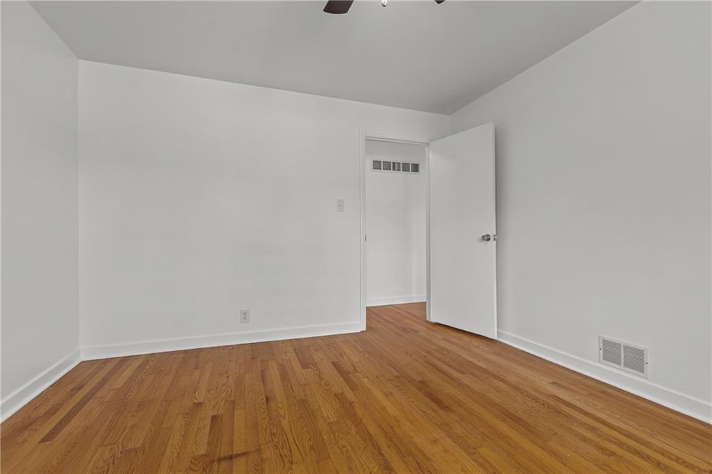 1300 Main Street Bentleyville, PA 15314 - Photo 25 of 36 a view of an empty room with wooden floor