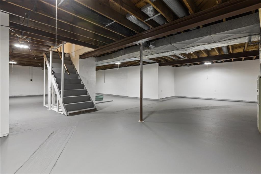 1300 Main Street Bentleyville, PA 15314 - Photo 26 of 36 a view of an empty room with stairs