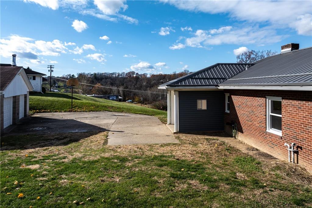 1300 Main Street Bentleyville, PA 15314 - Photo 7 of 36 a view of a house with a yard