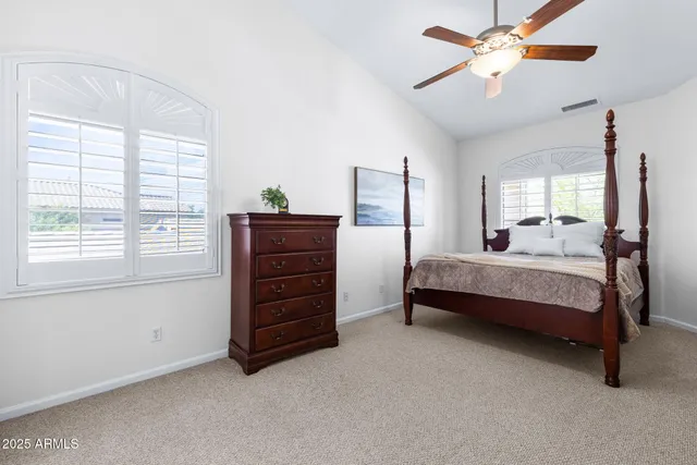 a bathroom with a sink vanity tub and shower