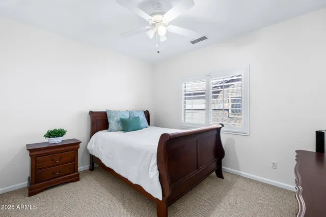 a bathroom with a sink a vanity and a mirror