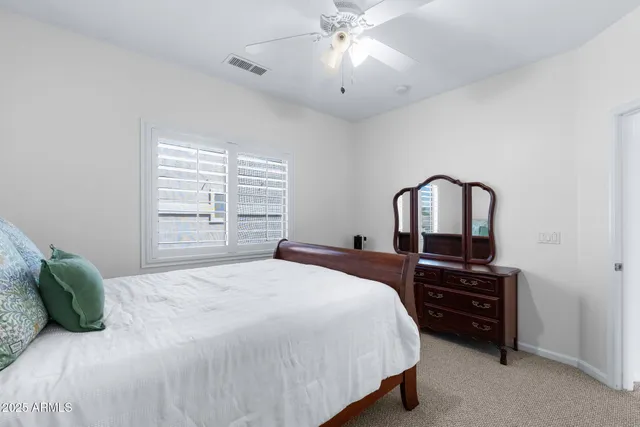 a front view of house with yard and outdoor seating