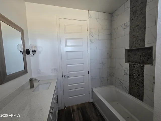 a bathroom with a bathtub