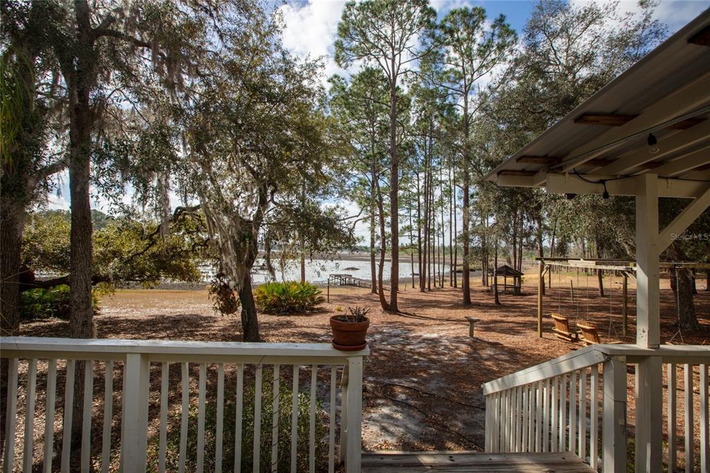 5711 Caribbean Circle Keystone Heights, FL 32656 - Photo 12 of 61 a view of street with trees