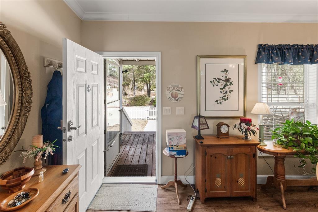 5711 Caribbean Circle Keystone Heights, FL 32656 - Photo 20 of 61 a bedroom with furniture and a window