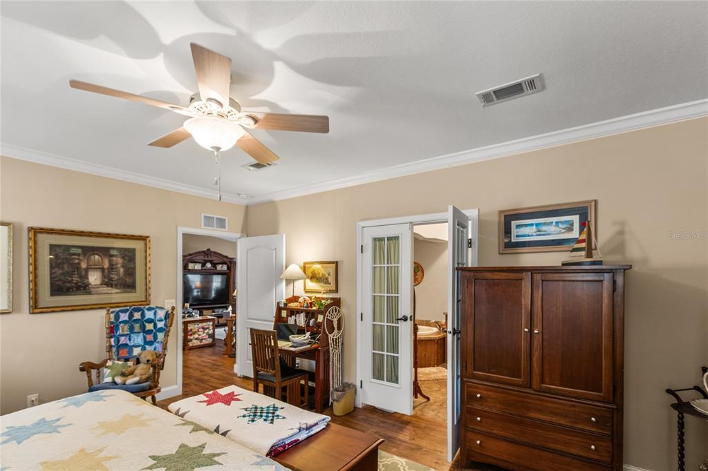 5711 Caribbean Circle Keystone Heights, FL 32656 - Photo 41 of 61 a bedroom with furniture and a window