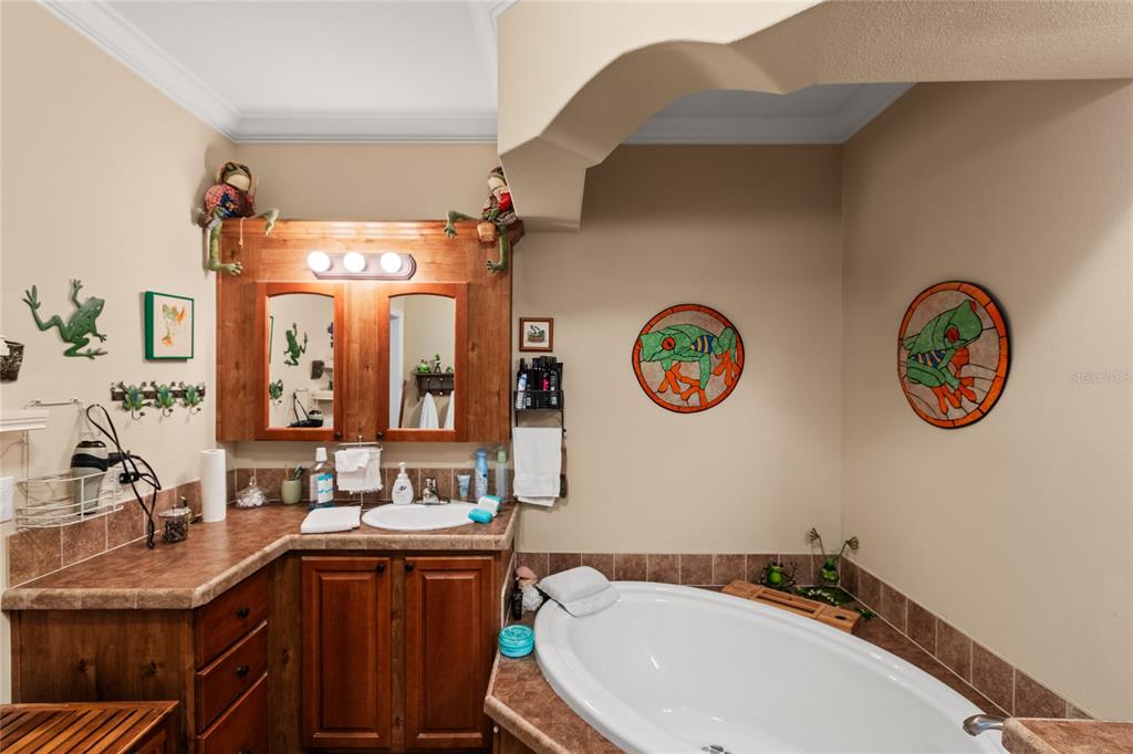 5711 Caribbean Circle Keystone Heights, FL 32656 - Photo 43 of 61 a bathroom with a sink and a mirror
