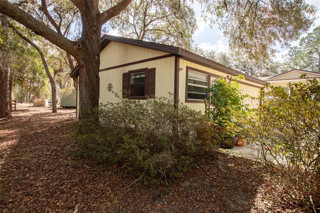 5711 Caribbean Circle Keystone Heights, FL 32656 - Photo 55 of 61 a view of a house with a yard