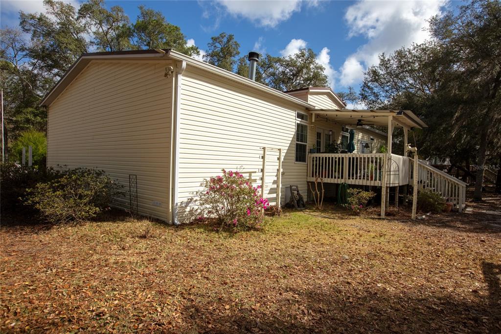 5711 Caribbean Circle Keystone Heights, FL 32656 - Photo 58 of 61 a view of a house with a yard