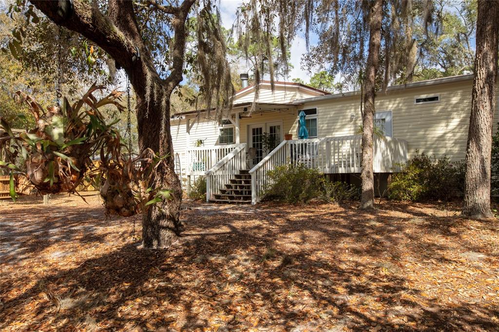 5711 Caribbean Circle Keystone Heights, FL 32656 - Photo 9 of 61 a view of a small white house