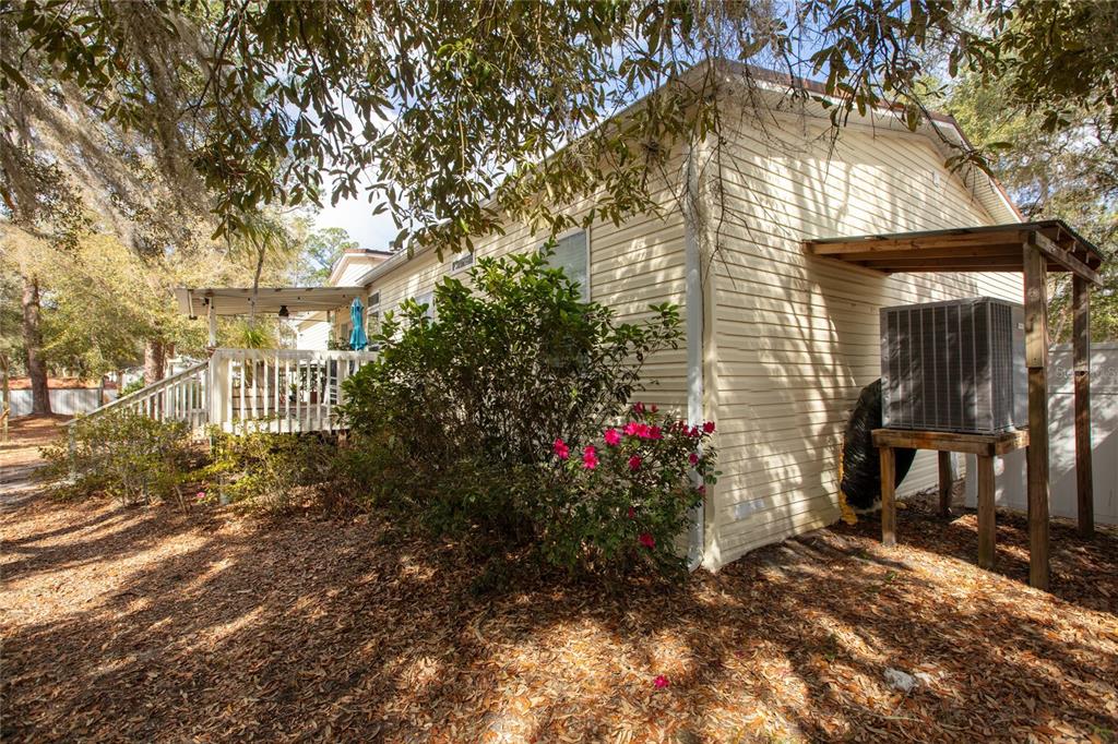 5711 Caribbean Circle Keystone Heights, FL 32656 - Photo 10 of 61 a view of a house with a tree