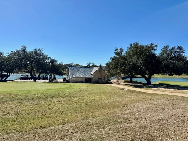 a view of a swimming pool and lake view