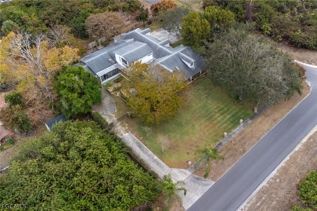 2724 3rd Street Southwest Lehigh Acres, FL 33976 - Photo 24 of 26 a view of a lake from a balcony