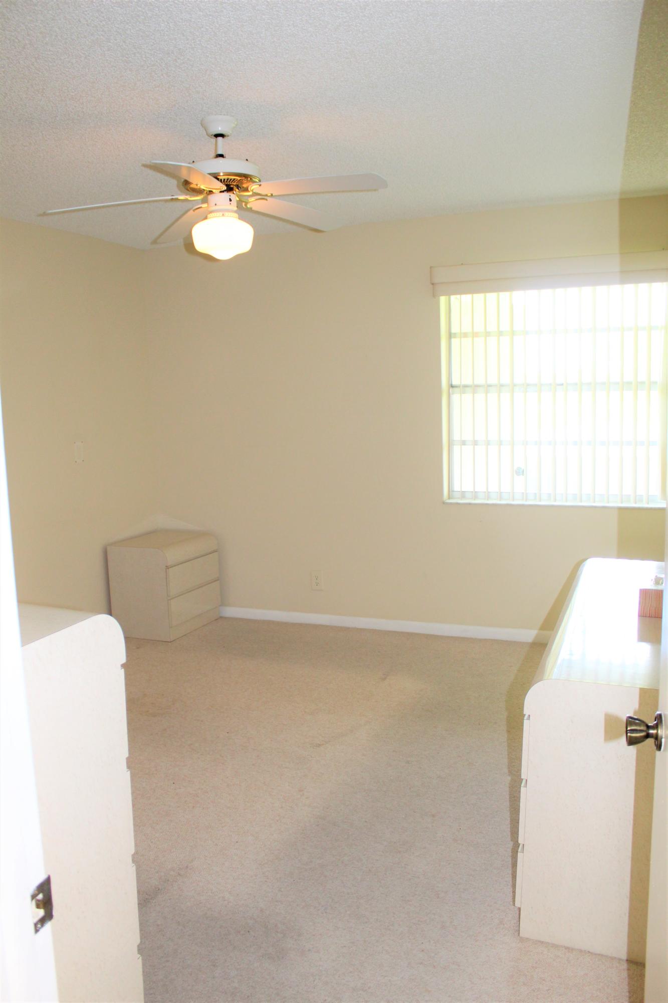 956 Normandy Trail Delray Beach, FL 33484 - Photo 10 of 15 Master Bedroom